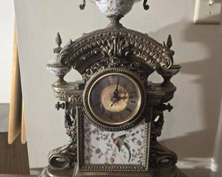 Stunning porcelain and brass mantel clock
