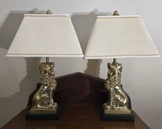 Pair of hollow metal lion lamps
