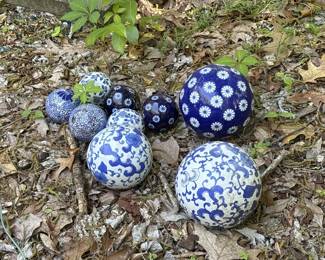 9 blue and white decorative spheres
