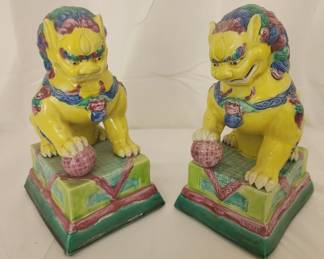 Pair of antique porcelain foo dog statues
