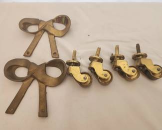 Lot of brass decor and castor wheels
