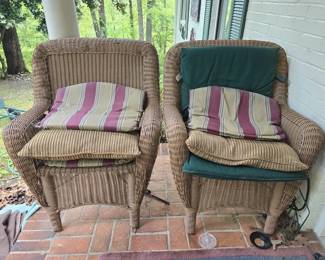 Pair of brown wicker chairs
