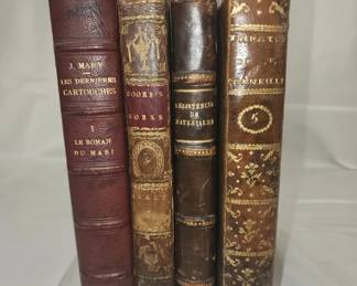 Lot of 4 antique hard back books
