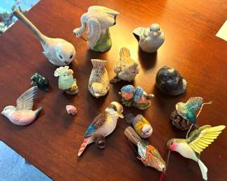 Several Tiny Bird Animal Figurines