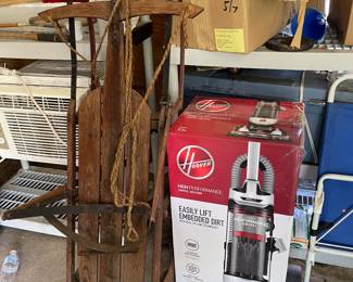 New Hoover vac, vintage sled 