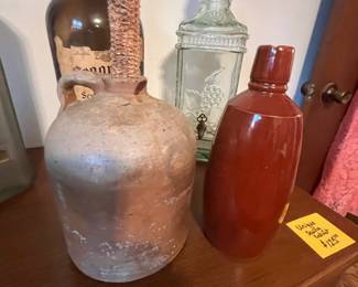 Antique crock jug and a crock bottle
