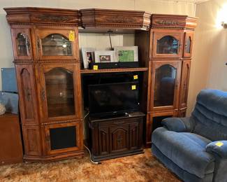 Inside the living room - Great 4pc. entertainment center! And a couple of nice flat screen TV's