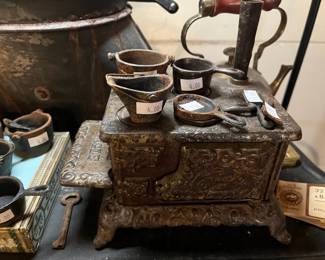 Vintage salesman sample Eagle cast iron stove and iron accessories