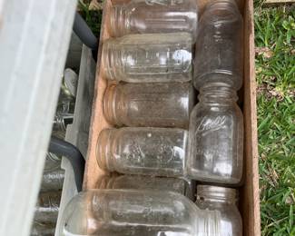 Wood crate full of jars