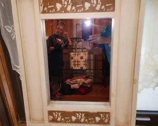 Mirror with elephant border