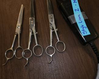 1 pair ice tempered feather and the other 2 Detroit scissors