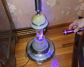 Antique tall lamp with bottom glowing stone