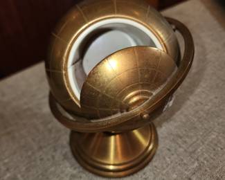 Vintage metal world globe cigarette holder