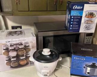 Small Kitchen Appliances And A Rotating Spice Rack