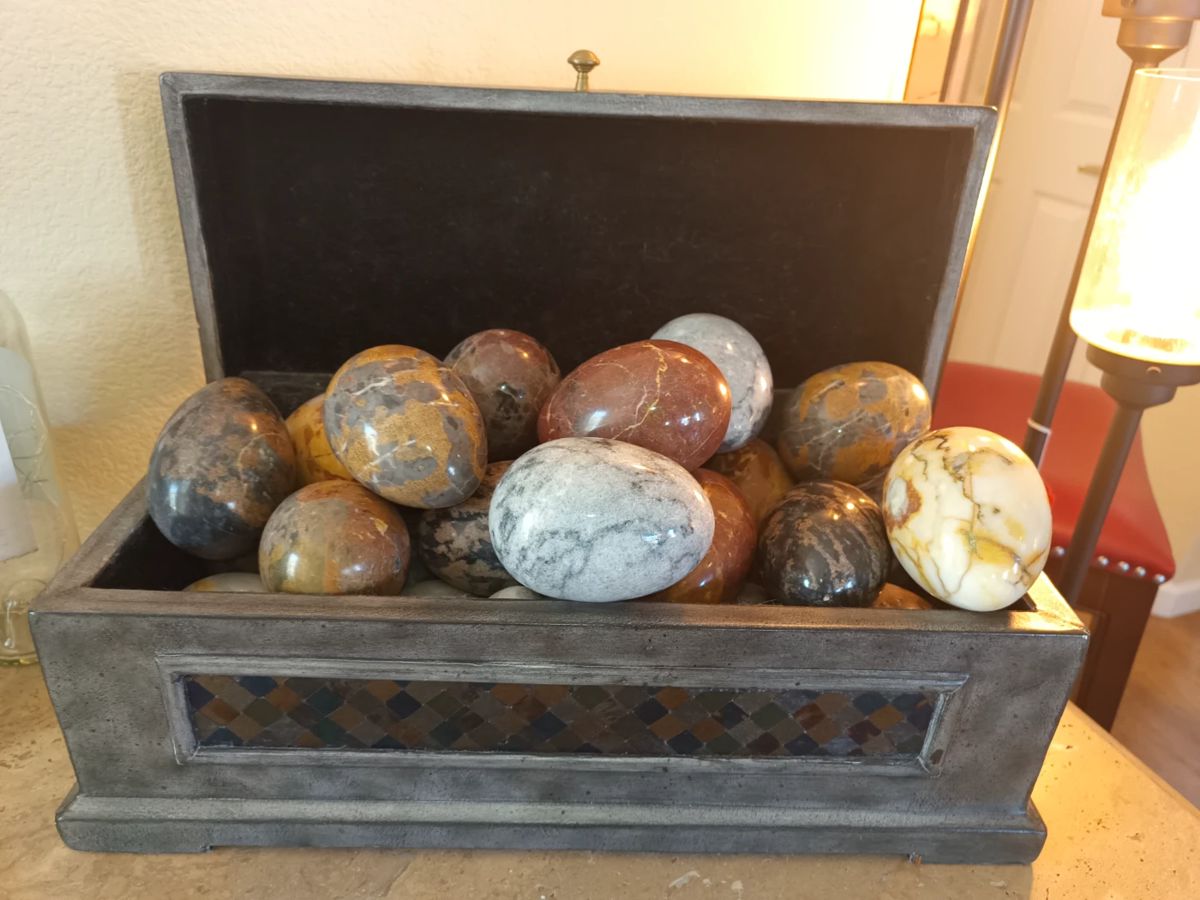 25 Marble eggs.  Who knows, maybe they are petrified dragon eggs.