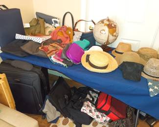Hats and luggage! Must be vacation time, pick a place on the globe!