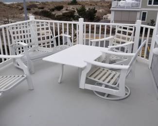 Telescope table, two swivel chairs & one loveseat (cushions available, not shown)