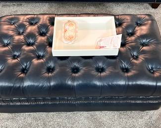 Matching Haverty’s Navy Blue Tufted Leather Ottoman