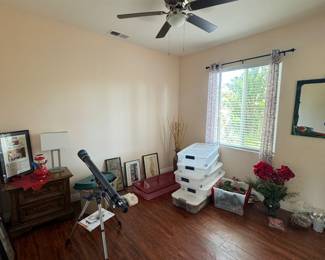 telescope, Christmas decor, framed art, bedside table and lamp