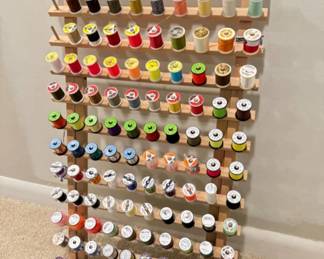 Organized Filled Rack of Fly Line Thread