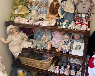 Display Shelf with Several Dolls