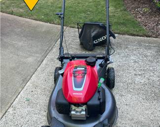 STAR Attraction! Honda Gas powered Lawn Mower. Get here early to avoid being disappointed!