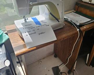 Sewing machine, carry case and thus table. Prices as shown. Works.