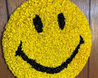 Plastic "popcorn" smile face.