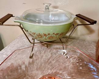 Vintage Pyrex gold medallion casserole dish with lid and warmer stand.