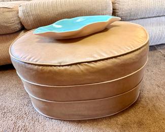 Round ottoman.