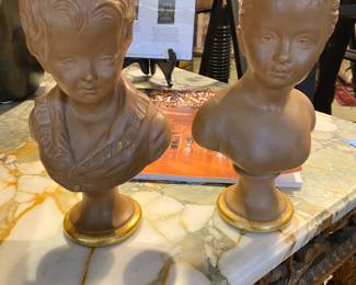 Two terra-cotta sculptures signed Houdon