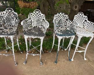 Four metal barstools from the Mary Kay mansion.