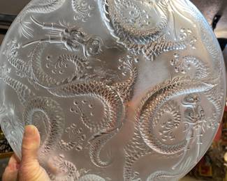 A pair of matching dragon chargers signed Sabino.