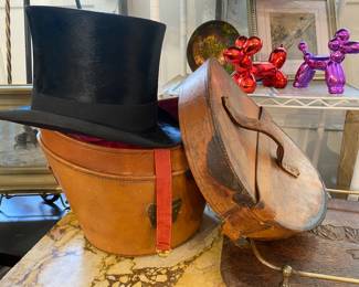 Fabulous 19th century black beaver top hat with leather carrying case original label.