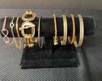  04 Assorted Gold Colored Bracelets 