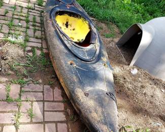 Kayak that was painted dark 