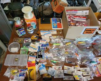 Lots of vintage lures and new old stock fishing equipment. 