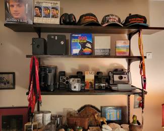 Quite a few vintage cameras, Polaroid and others.