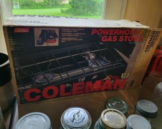 Colman stove, appears to be new in original packaging, but I didn't remove it yet. 