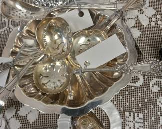 Sterling silver berry spoons.