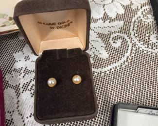 14k gold pearl earrings.