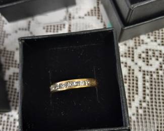 18k gold diamond wedding band.