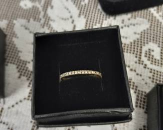 14k gold diamond band.