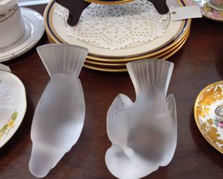 Lalique crystal bird figurines.