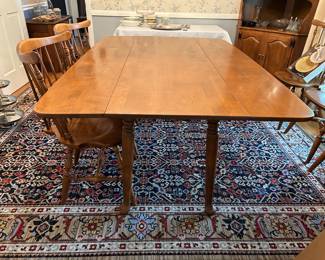 Ethan Allen maple drop leaf dining table with 6 chairs. 66”L x 21”-42” W