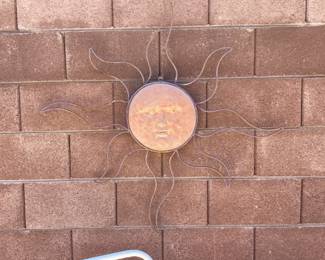 Metal & clay sun face