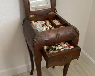 Antique sewing cabinet