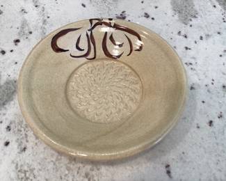 Pottery dish signed