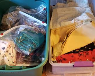 Several bins of fabric