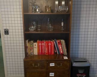 12.	Heckman campaign style bookcase